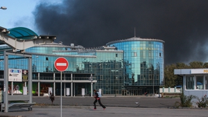 Black smoke rises above the International Airport in Donetsk