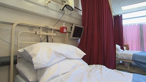 Minister Simon Harris said 40 or 50 beds are closed in the health service every week due to infection controls