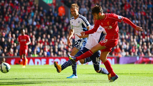 Liverpool's Adam Lallana scores the opening goal at Anfield