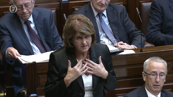 Joan Burton said the law does not allow for water to be cut off