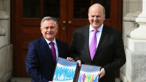 Michael Noonan (R) said the double Irish scheme would be phased out