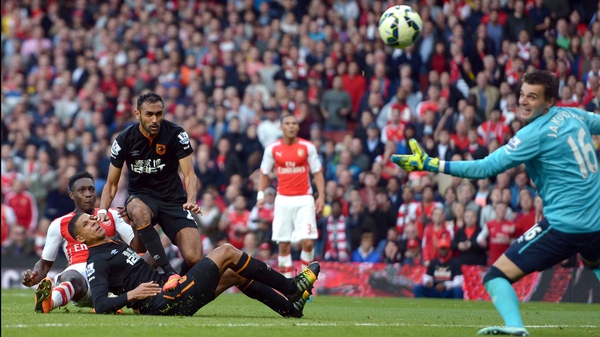 Danny Welbeck beats Eldin Jakupovic in the Hull goal to seal a late point for Arsenal at the Emirates