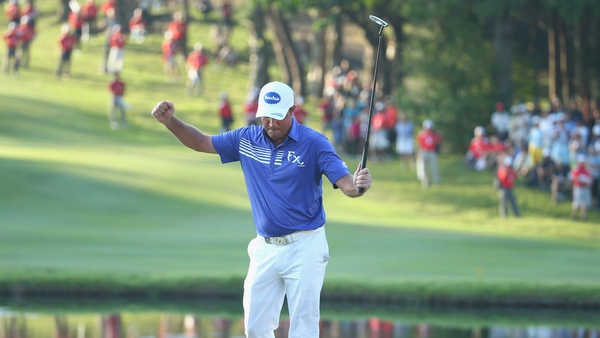 Scott Hend celebrates on the 18th hole during the final round of the Hong Kong open