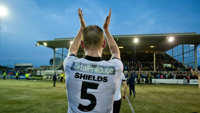 Michael Shields claps the crowd as he walks off the pitch