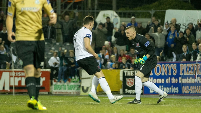 Peter Cherrie celebrates after Ryan Brennan's penalty let Dundalk off the hook