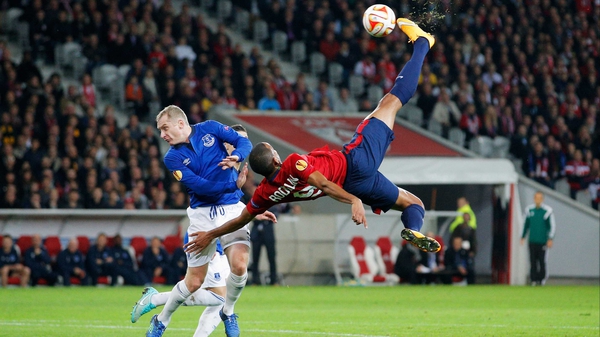 Lille's Ronny Rodelin attempts the spectacular with Tony Hibbert challenging