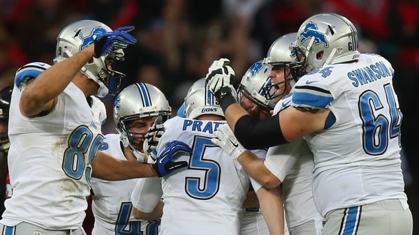 Matt Prater (centre) of the Detroit Lions celebrates with team-mates after kicking a 48-yard field goal