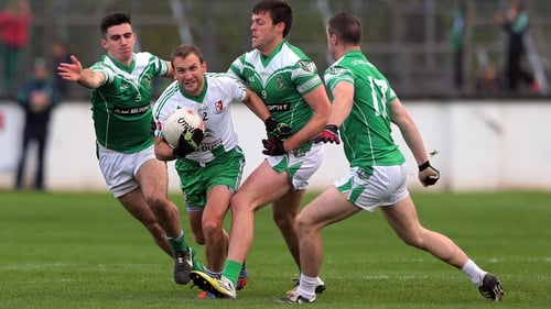 Michael Browne of Sarsfields surrounded by the Moorefield defence