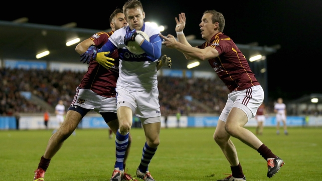 St Vincent's' Tomas Quinn with David Kelly and Shane Lyons of St Oliver Plunkett's