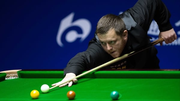 Mark Allen held out for a 6-4 victory over John Higgins