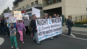 Protesters carry a banner through Wicklow town