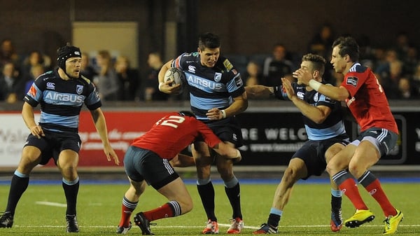 Cardiff Blues' Richard Smith is tackled by Munster's Rory Scannell