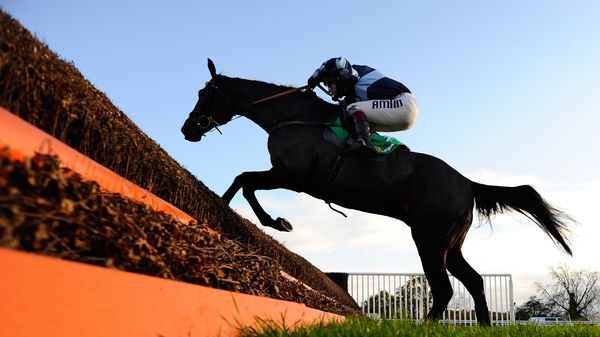 Menorah clearing the last to win Charlie Hall Steeple Chase at Wetherby