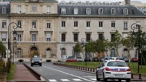 The UN health worker has been placed in isolation at the Begin military hospital in paris