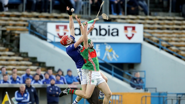 Noel McGrath battles with Denis Maher of Thurles Sarsfields