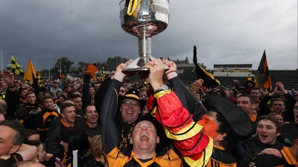 Austin Stacks' Darragh Long celebrates with the cup