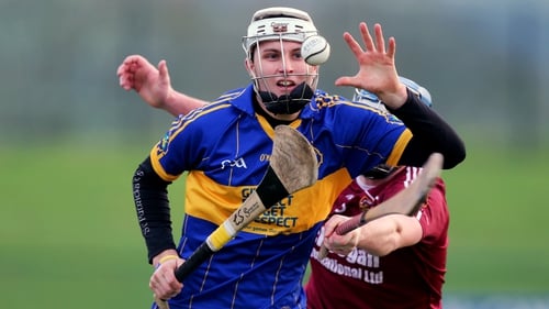 Portaferry's Eoghan Sands in action against Cushendall's Paddy McNaughton