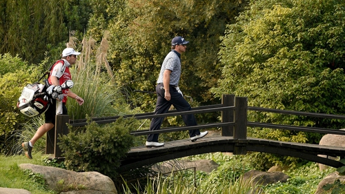 Graeme McDowell was seven under after 12 holes