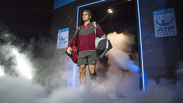 Roger Federer makes his entrance to the O2 Arena in London