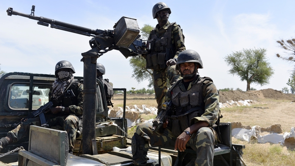 Soldiers patrol Nigerian border where Boko Haram have carried out fatal attacks in recent weeks
