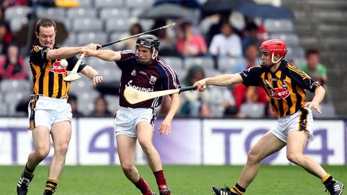 Michael Kavanagh and Tommy Walsh of Kilkenny tackle Niall Healy of Galway