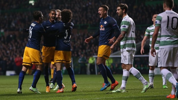 Salzburg's Brazilian forward Alan celebrates with team-mates after scoring their second goal