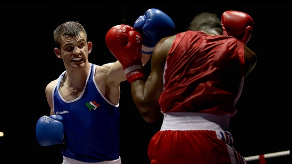 Adam Nolan (blue) in action against Daouda Sangare