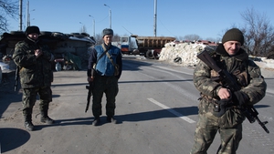 Pro-Russian rebels standing guard near the airport in Donetsk