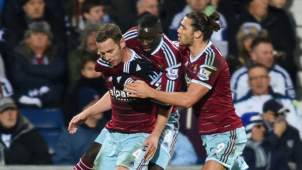 Goalscorer Kevin (L) celebrates with West Ham team mates Cheikhou Kouyate and Andy Carroll