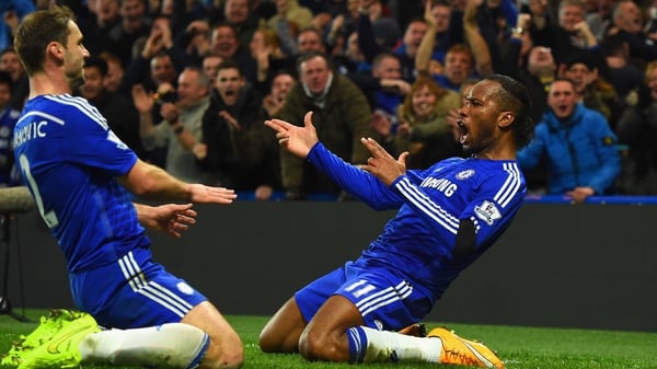 Didier Drogba takes the plaudits after he netted Chelsea's second against their London rivals