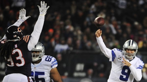 Tony Romo (R) threw three touchdown passes