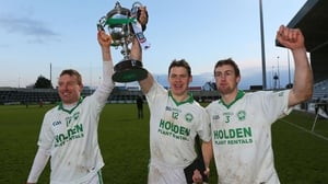 Ballyhale Shamrocks' Mark Aylward (L), captain TJ Reid and Joey Holden (R) celebrate with the cup after the game