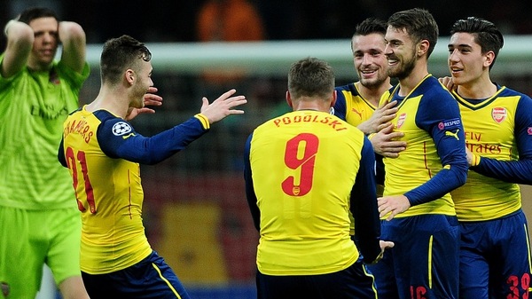Arsenal's Aaron Ramsey celebrates with team-mates after scoring his second goal