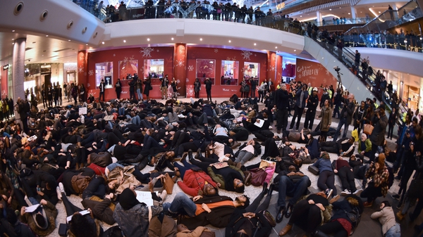 Demonstrators blocked the Westfield shopping centre by lying down on the floor