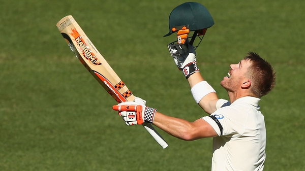 David Warner of Australia celebrates his second centruy of the first Test match between Australia and India