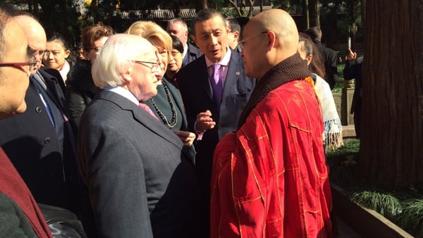 Upon his arrival at Lingyin temple, President Higgins was greeted by the head monk Guang Quan