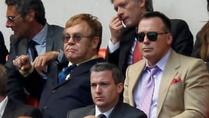 Elton John and David Furnish watch Watford FC play Crystal Palace in May 2013
