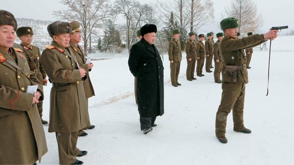 Kim Jong-un observes he North Korean military's winter training at an unknown location
