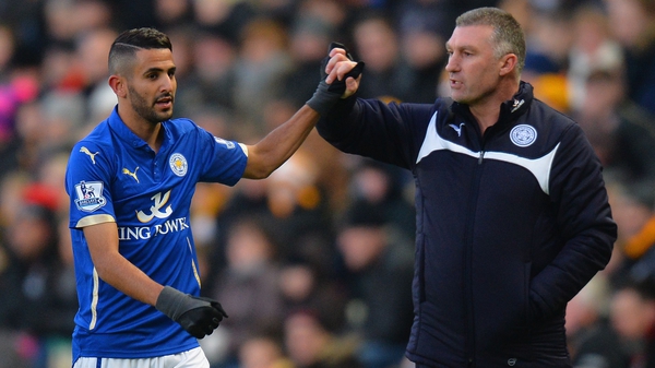 Leicester City boss Nigel Pearson congratulates goalscorer Riyad Mahrez