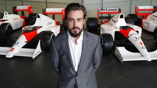 Fernando Alonso poses as McLaren-Honda announces its new driver line-up for 2015