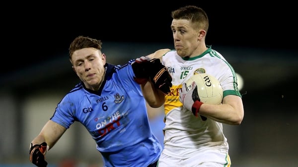 Dublin's John Small tries to get to trips with Nigel Dunne of Offaly at Parnell Park last night