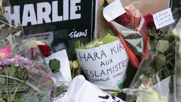 Tributes to the 12 victims of Wednesday's attack in Paris