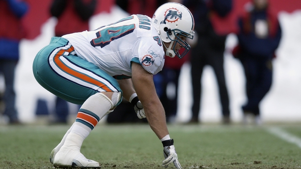 Rob Konrad on terra firma, playing for the Miami Dolphins in 2002