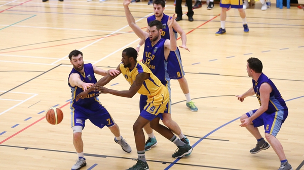 UCD Marian's Conor Meany puts pressure on Orlando Parker of UL Eagles