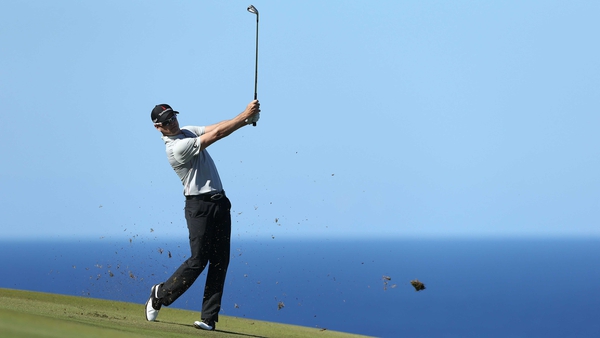 Zach Johnson plays his second shot on the 10th tee at the Kapalua Resort