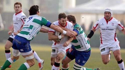 Ulster's Darren Cave tackled by Alessandro Zanni and Rupert Harden of Treviso