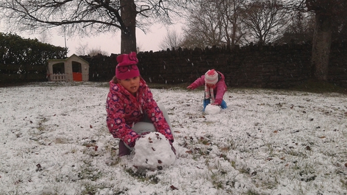 Children making a snowman in Carrick-on-Shannon, Co Leitrim (Pic: Carole Coleman)