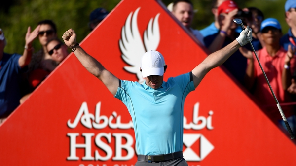 Rory McIlroy celebrates after hitting a hole in one at the Abu Dhabi HSBC Golf Championship