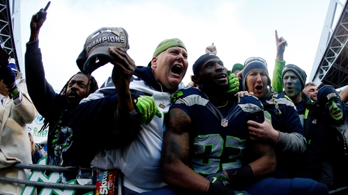 Ricardo Lockette of the Seattle Seahawks celebrates victory with Seahawks fans