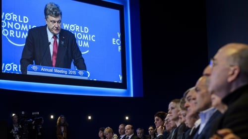 Petro Poroshenko told the forum that Russian troops, tanks and artillery are backing separatists